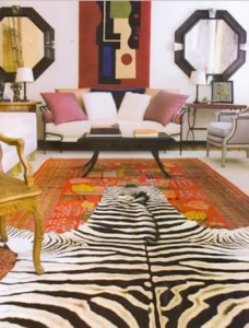 This hide rug over a Persian looks amazing