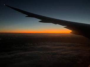 Beautiful sunset from airplane flight from Paris to Melbourne
